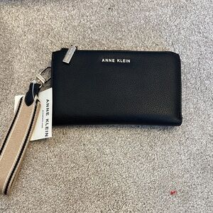 Anne Klein Black Wristlet with Tan Strap